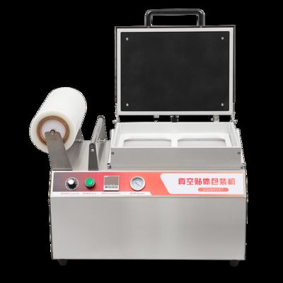 Máquina de vedação de pele a vácuo de pressão manual DQ300VST com aço inoxidável 304 de qualidade alimentar e molde de alumínio anodizado 6061 para vedação de bandejas de fast food